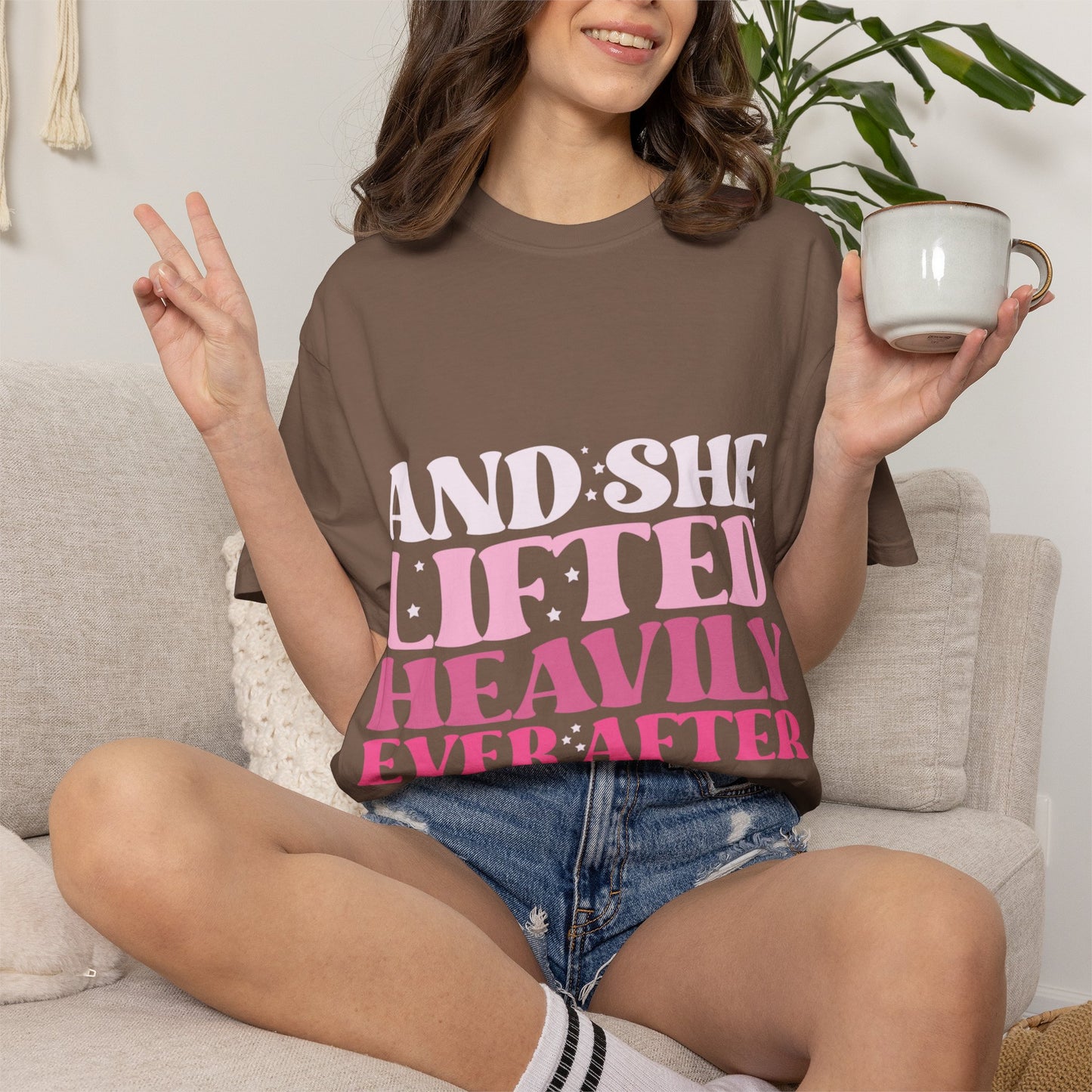 T-Shirt — "And She Lifted Heavily Ever After" Strength Training Graphic Tee
