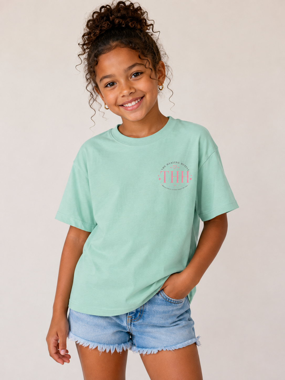 Youth Tee — "Big Dreams, Bigger Faith" Pink Bow Graphic