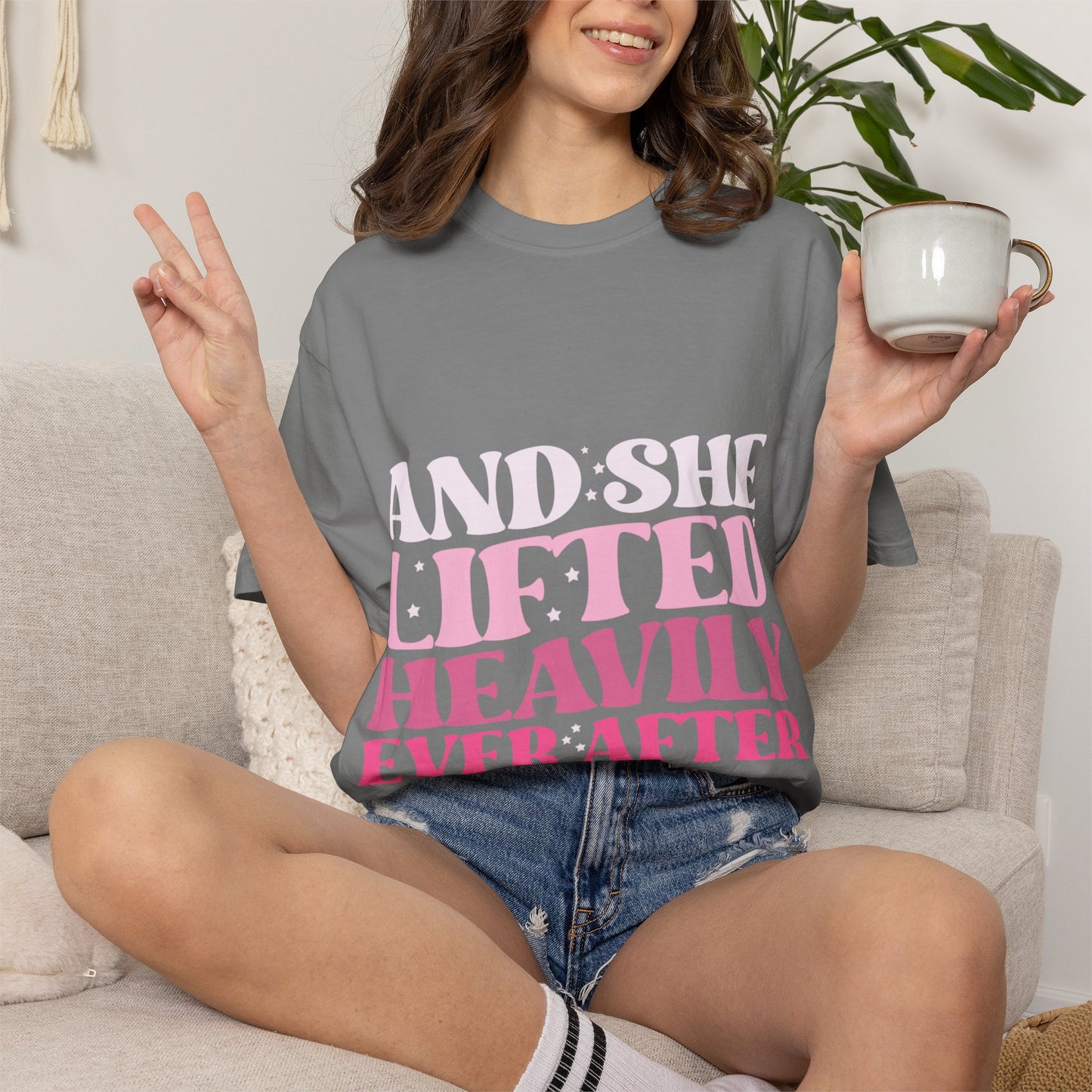 T-Shirt — "And She Lifted Heavily Ever After" Strength Training Graphic Tee